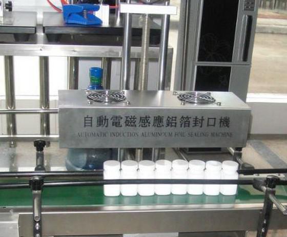 aluminum foil sealing machine foil induction.jpg
