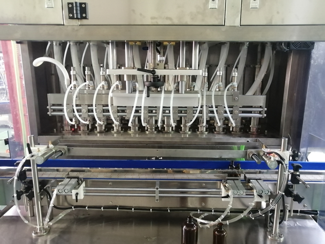 Mašina za punjenje 12 glava sa grejačem za mešanje (4).jpg