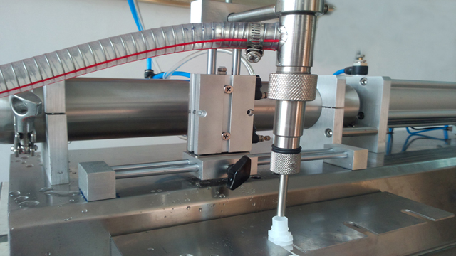 single head filling machine for spout bags with hopper izljev filler.jpg
