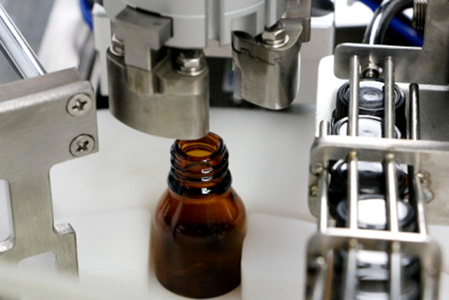 mašina za punjenje boca ulja tabletop.jpg